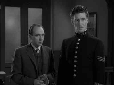 Is this the man you saw
letting Harrison into his shop? - Alfred Hitchcock Presents