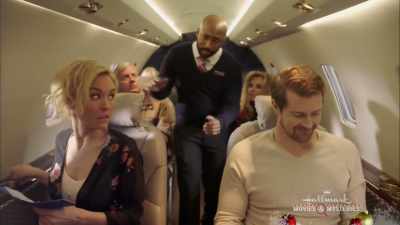 - Is there a problem?
- Yes. I'm on the wrong plane. - Romance at Reindeer Lodge
