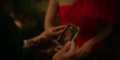 Is this your mother?
You look like her. - Katy Keene