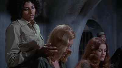 Isn't her hair beautiful, Theresa? - Women in Cages