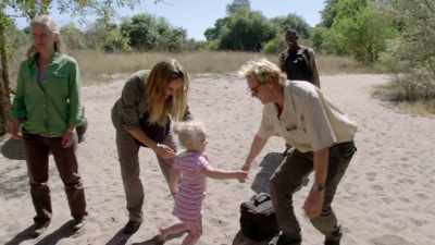 It is a challenge
raising children in the bush, - In the Footsteps of Elephant