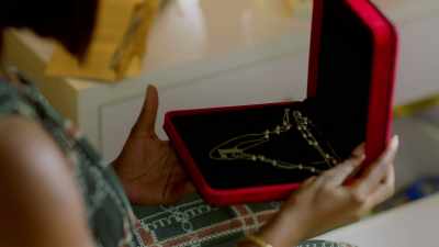 It had an L-shaped pendant. - A Weekend to Forget