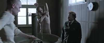 It is forbidden to speak
or exchange things. - The Photographer of Mauthausen