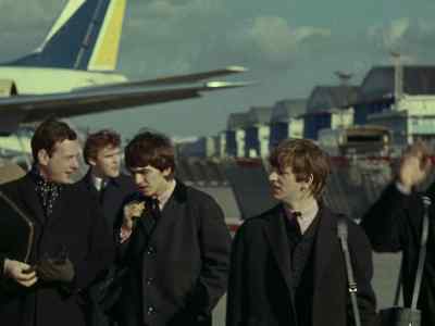 It was funny, 'cause once
we got here, we learned - Beatles '64