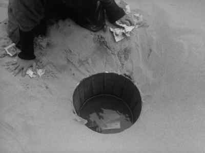It hasn't rained a drop
in over three weeks. - Woman in the Dunes