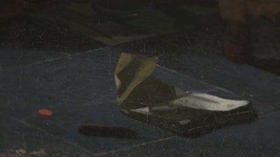 It looks to me
as if it's probably a letter - Vermeer: The Greatest Exhibition