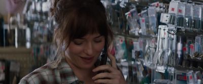 It means though we won't be able to fly in for graduation - Fifty Shades of Grey