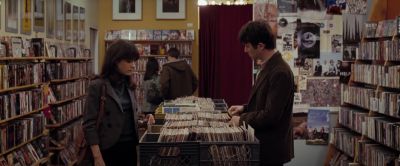 It pains me we live in a world... - 500 Days of Summer