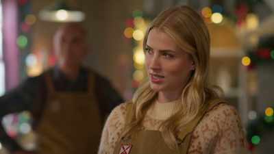 It says "Koerier Klomp." - Christmas on Windmill Way