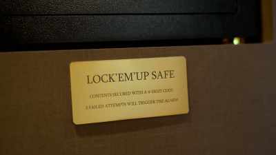 It says, "Lock 'em up safe.
Contents secured with a four-digit code." - The Mole