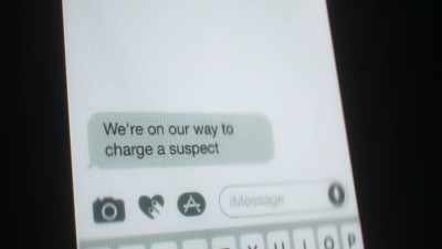 It says,
"The suspect is in custody - Mother Undercover
