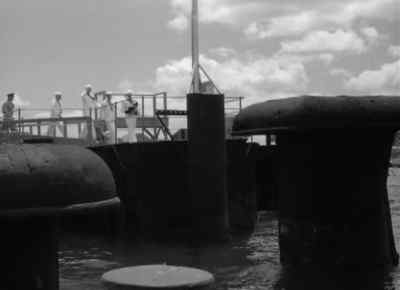 It seemed strange
saluting the quarterdeck, - Big Jim McLain