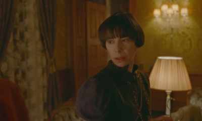It should be black.
Black, to contrast with the pearls. - Spencer