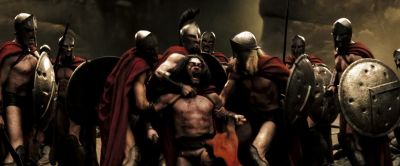 It takes three men to restrain him and bring him back to our own - 300