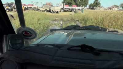 It wasn't long before
the swamp trucks were put to the test. - In the Footsteps of Elephant