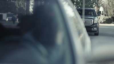 It's a black luxury suv.
Yeah, you can't miss it. - Lies Between Friends