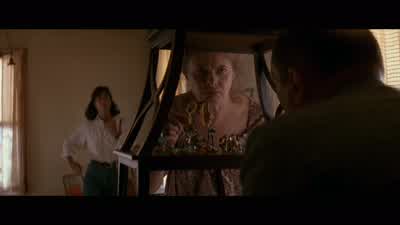 It's a giraffe, drinking. - Falling Down