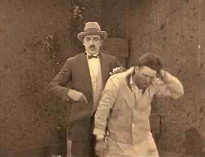 "It's a riot! Lock the doors
and protect the money!" - The Strong Man