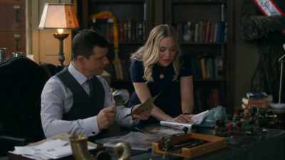 It's a silver owl necklace - Signed, Sealed, Delivered: The Vows We Have Made