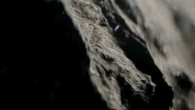 It's a slow process but
eventually clumps grew into - One Strange Rock