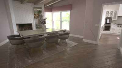It's about 6,229 square feet, - Buying Beverly Hills