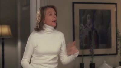 It's about a divorced woman - Something's Gotta Give