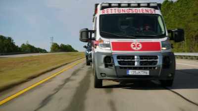 It's an ambulance.
Don't they go fast? - True Lies