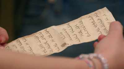 It's in some kind of
strange, jumbled language. - Treasure Trackers