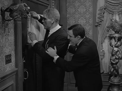 - It's Mama.
- All right. - The Addams Family