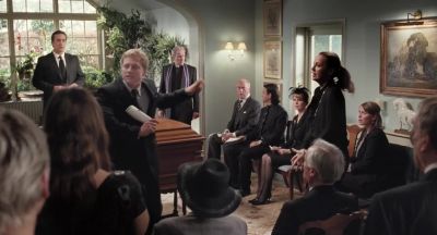 It's moving around in there Can't you see - Death at a Funeral