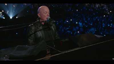 ♪ It's nine o'clock
on a Saturday ♪ - Billy Joel: The 100th - Live at Madison Square Garden