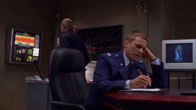 - It's on security lockout, sir.
- Get it open, Major. Now. - Stargate SG-1