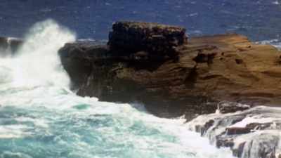 It's paradise framed
by crashing waves -- - The Pacific War in Color