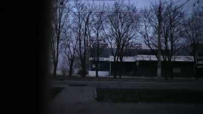It's past curfew,
so Vladimir accompanies us. - 20 Days in Mariupol