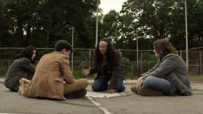 It's surrounded by a fence,
which means - The Walking Dead: World Beyond