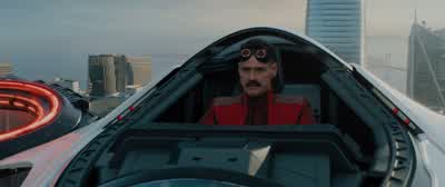 Welcome to San Francisco Mr wachowskiAre you enjoying the clam chowderIt's the government wack job who keeps trying to kill usUnsuccessfullyNice of you to swing by on your way to comic conYeah what are you wearingIt's a flight suit designed to modulate my - Sonic the Hedgehog