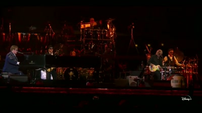♪ It's time we put the flame torch
to their keep ♪ - Elton John Live: Farewell from Dodger Stadium