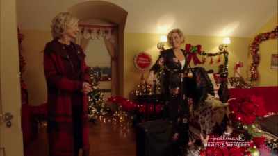 - It's very festive.
- It's my favorite. - Romance at Reindeer Lodge