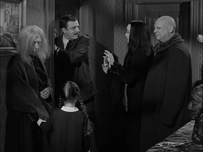 It's worse than I thought. He's wearing it. - The Addams Family