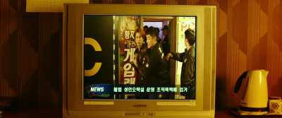 Jang who operates
several dozen slot arcades - The Gangster, the Cop, the Devil