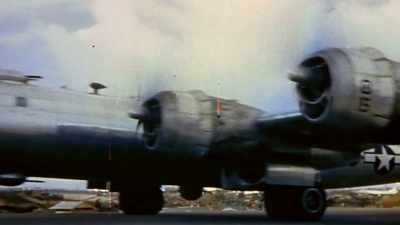 Japan can only guess when
it will thunder overhead. - The Pacific War in Color
