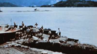 JAPANESE DISARM THEMSELVES
UNDER ALLIED SUPERVISION. - The Pacific War in Color