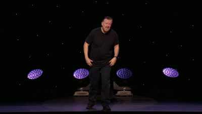 Jeans, black T-shirt, - Ricky Gervais: SuperNature