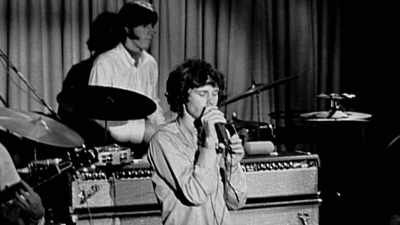 Jim jumped off the stage
onto the dance floor, - The Rainbow