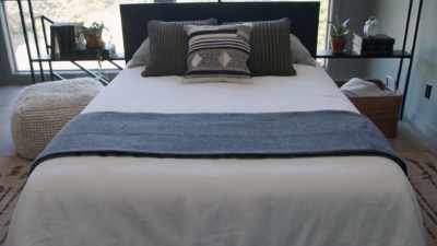 JOANNA:
Don't you love how this turned
out -- this headboard/rail? - Fixer Upper: Behind the Design
