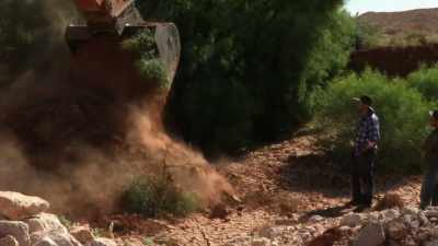 John's excavator
will move a mountain of earth. - Outback Opal Hunters