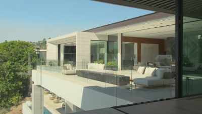 [Jon] So you can see,
this is a solid-walnut, single-pivot door. - Buying Beverly Hills