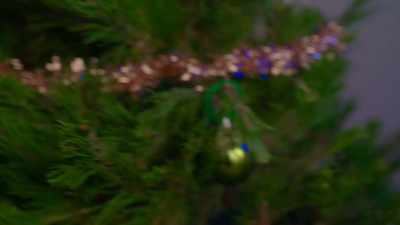 [Joy to the World continues
playing on radio] - Christmas Keepsake