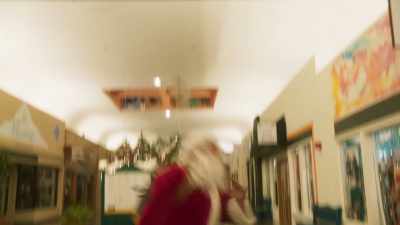 -[joyful music]
-[muffled talking] - Santa Fake