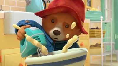 [joyful music] - The Adventures of Paddington